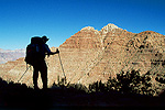 Silhouetted backpacker admiring the Grand Canyon. #10010. (c) Rob Kleine.  All Rights Reserved